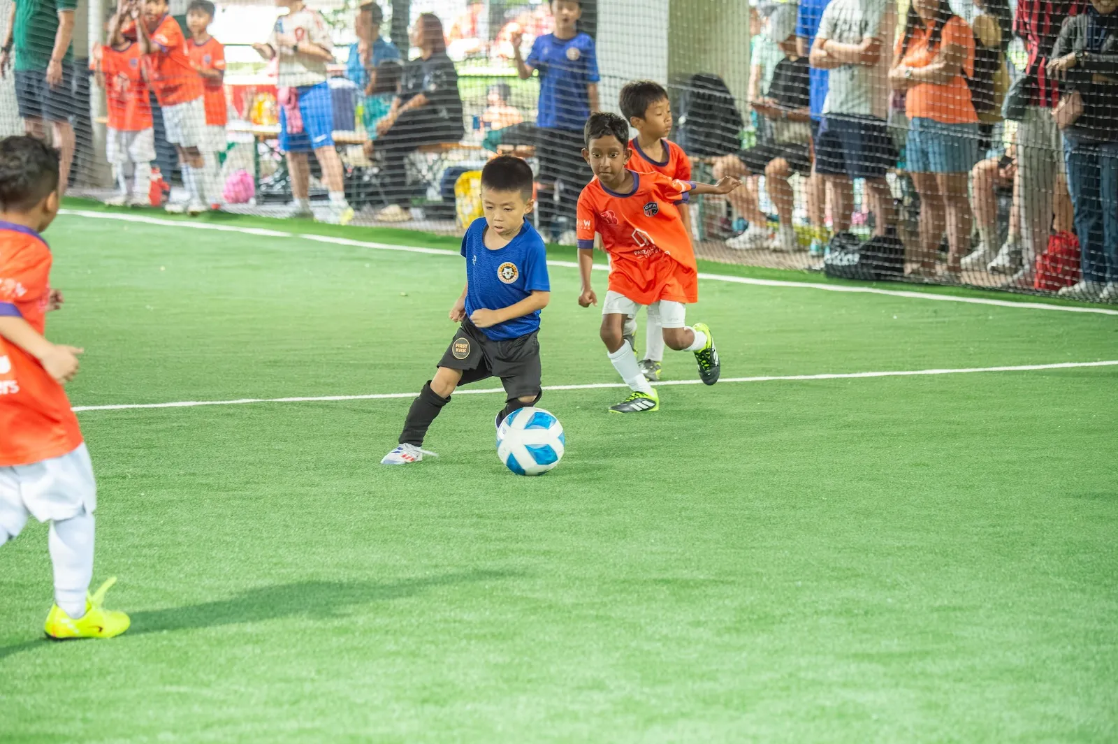 Youth football action shot at ARK Sports Village